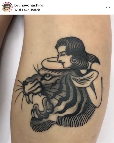 A Woman With A Tiger Tattoo On Her Leg And The Words Wild Love Tattoo