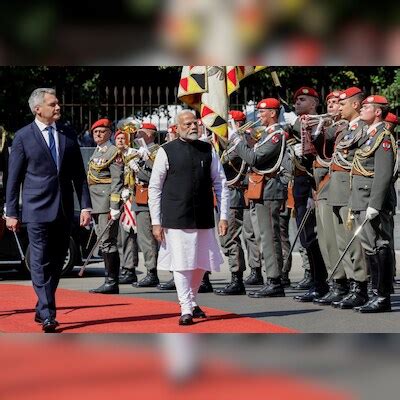 Pm Modi Receives Ceremonial Guard Of Honour In Vienna Signs Guestbook