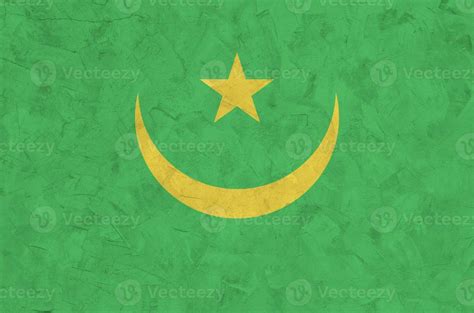 Mauritania Flag Depicted In Bright Paint Colors On Old Relief