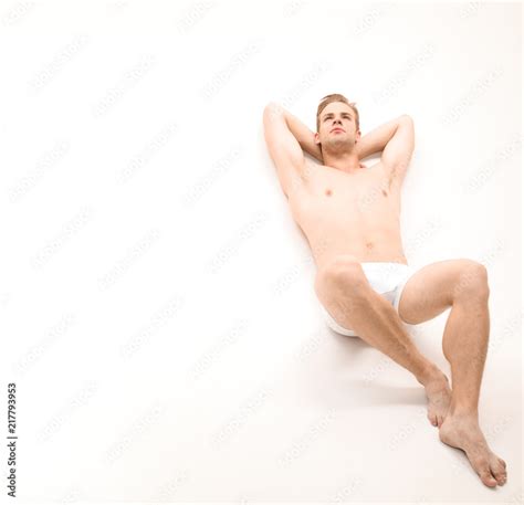 Handsome Sexy Naked Man Lying On White Background Sexy Man In Underwear Muscular Male Model In