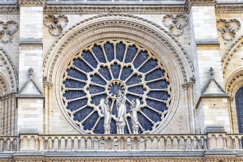 Stained Glass Window In Facade Of Notre Dame Cathedral North Rose