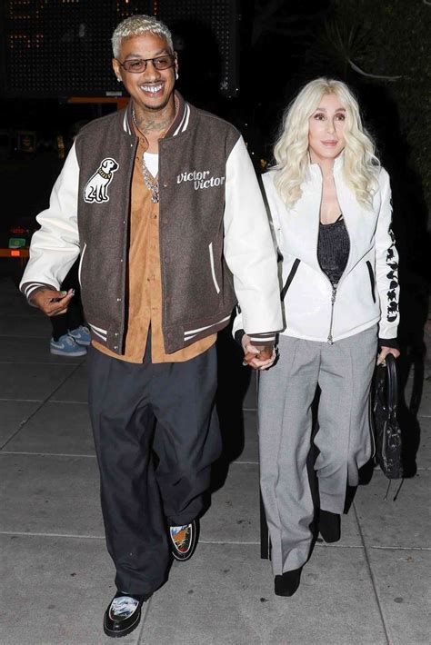 Cher And Alexander AE Edwards Hold Hands At Pre Grammy Party