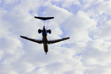 Plane Flying through Clouds in the Sky. Jet Aircraft. Stock Image - Image of lifestyles, landing ...