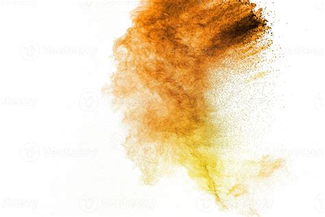 Orange and yellow powder explosion on white background.Orange yellow ...