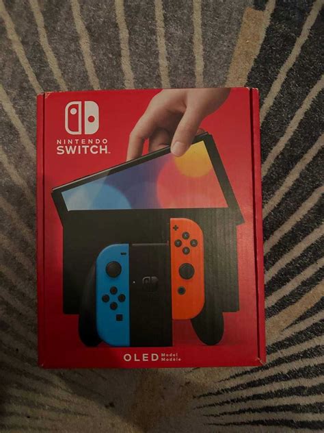 Konsola Nintendo Switch Oled Model Czerwono Niebieski Pozna Grunwald