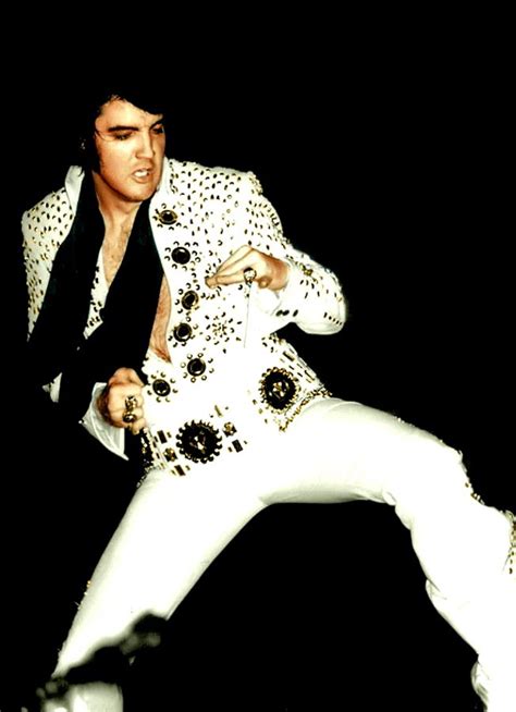 Elvis On Stage Doing Karate In The Spectrum Jumpsuit In 1971 Elvis Presley Music Elvis