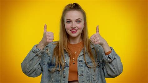 Teenager Girl Raises Thumbs Up Agrees Or Gives Positive Reply