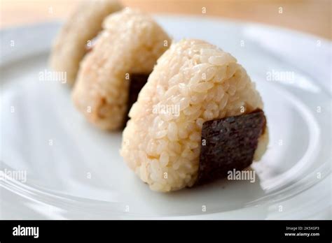 Onigiri, also known as omusubi, nigirizushi, or rice ball, is a ...