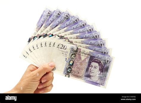 Fan Of Twenty Pound Notes With Hand Stock Photo Alamy