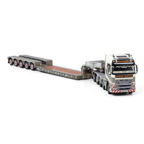 VOLVO FH 04 AVEC REMORQUE PORTE ENGINS