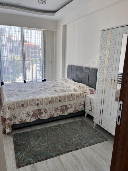 Kuşadası Davutlar merkezde ön cephe 2 1 yeni ve eşyalı daire Satılık