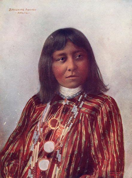 An Apache woman named Brushing Against, wearing traditional clothing ...