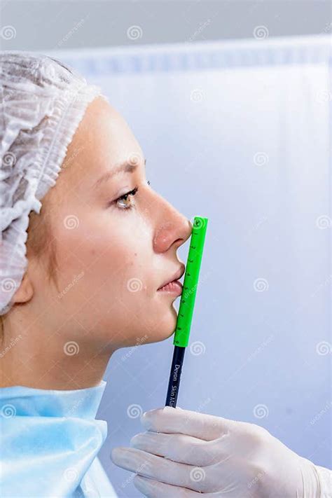 Plastic Surgery Doctor Patient Inspection And Consultation Stock Image