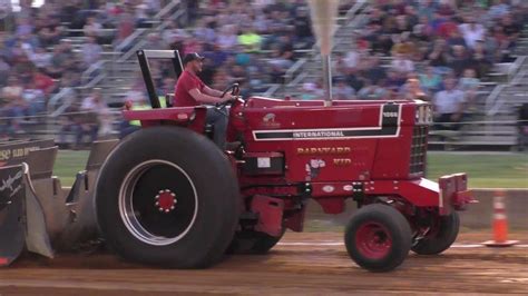 Tractor Pulling Exhibition Enhanced Farm Tractors In Action At