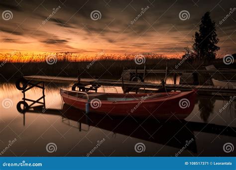 Rowing Boat on Lake at Sunset Stock Image - Image of stage, sunrise: 108517371