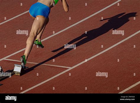 Start Female Athlete From Starting Blocks Running Sprint Distance