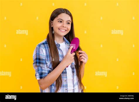 Cheerful Teen Girl Brushing Hair With Hairbrush Beautiful Teen Girl With Hairbrush Teen Girl