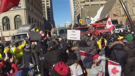 Man charged during vaccine mandates protest in downtown Toronto as road ...