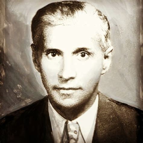 A Black And White Photo Of A Man In A Suit