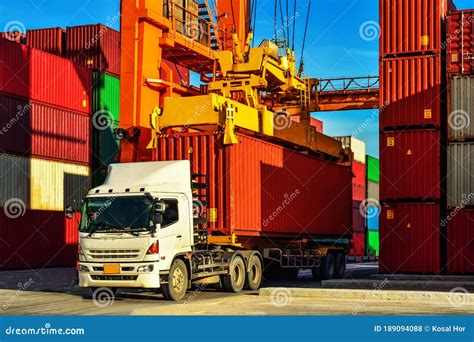 Container Handling Container Truck Picking Up Container At Yard Stock