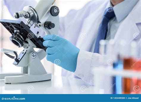 Asian Man Scientist Researching And Learning In A Laboratory Stock