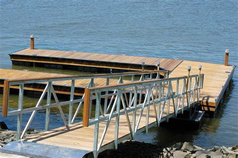 Custom Designed Steel Truss Floating Docks For Tidal Settings — The