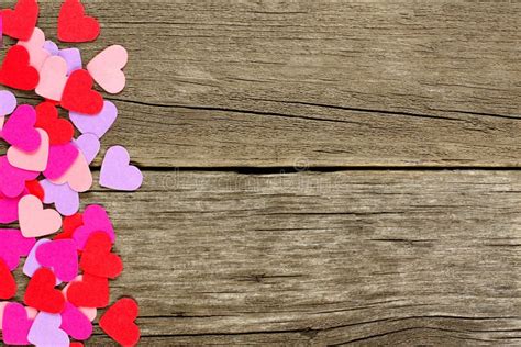 Paper Valentines Day Heart Side Border On Rustic Wood Stock Photo