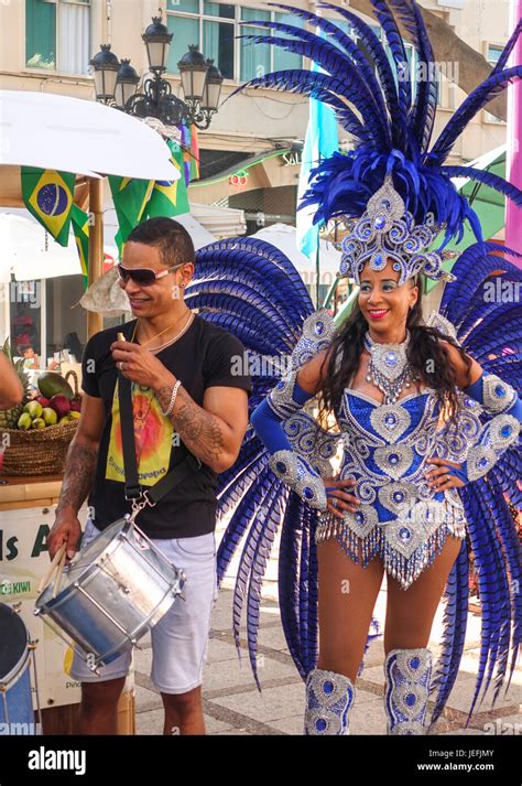 Brazilian Samba Dancer In Bikini And Feathers Drummer International Event Parade Torremolinos