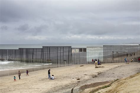 The border between Tijuana and San Diego is today a massive metal wall ...