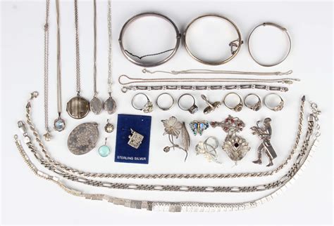 A Group Of Mostly Silver Jewellery Including Three Bangles Two