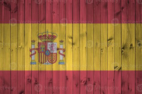 Spain Flag Depicted In Bright Paint Colors On Old Wooden Wall Textured