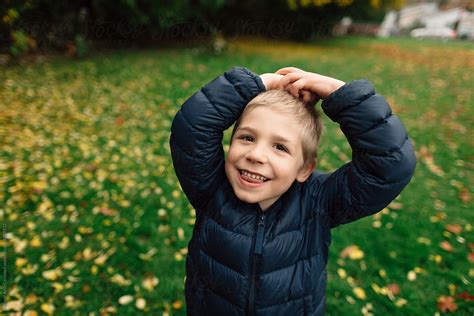 "Happy Little Boy Outside In Fall" by Stocksy Contributor "Rob And ...