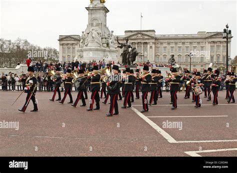 The Band Of The Royal Artillery Marching And Playing Outside Buckingham