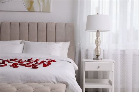 Beautiful Red Rose Petals on Bed in Room Stock Photo - Image of home ...