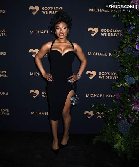 Megan Thee Stallion Sexy Flaunts Her Hot Cleavage And Legs In A Stunning Black Dress At Golden