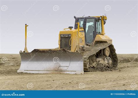 Bulldozer at a Construction Site Stock Photo - Image of gravel, dingy ...