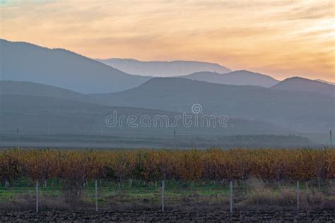 Silhouettes Of Mountains In The Sunset Haze Stock Photo Image Of Dawn