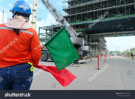 Construction Worker Waving Over Royalty Free Licensable Stock