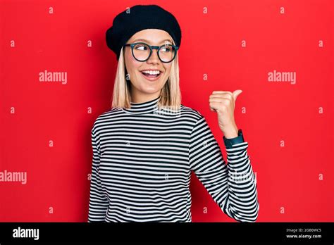 Beautiful Blonde Woman Wearing French Look With Beret An Glasses Smiling With Happy Face Looking