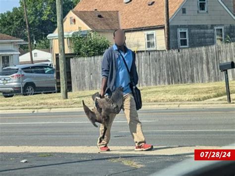 Ohio Wildlife Officials Give Context for Photo of Man Holding 2 Geese