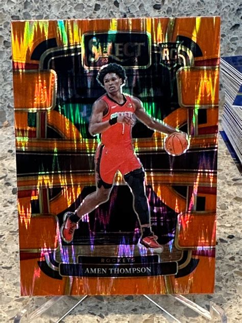 2023 24 Panini Select Amen Thompson Rookie Orange Flash Prizm 96