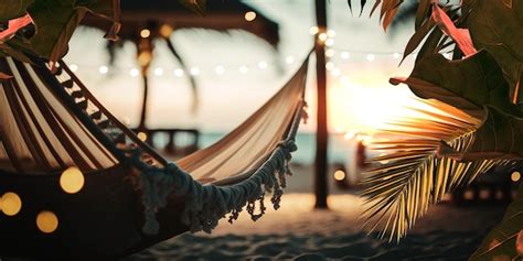 Premium Photo | A hammock on the beach at sunset