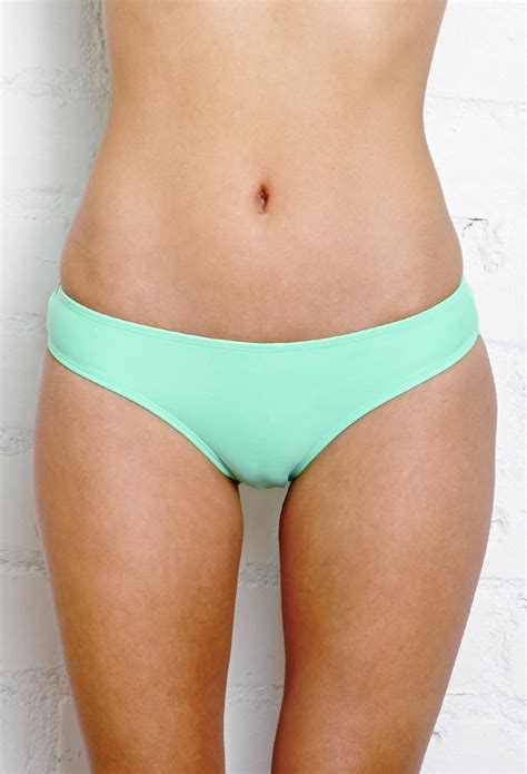 Lyst Forever 21 Standout Ruched Bikini Bottom In Green