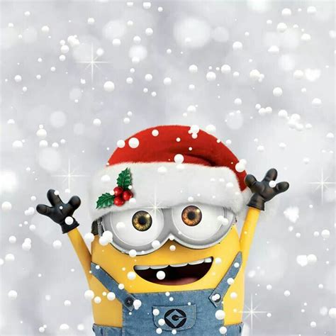 A Minion Wearing A Santa Hat And Glasses With His Arms In The Air While