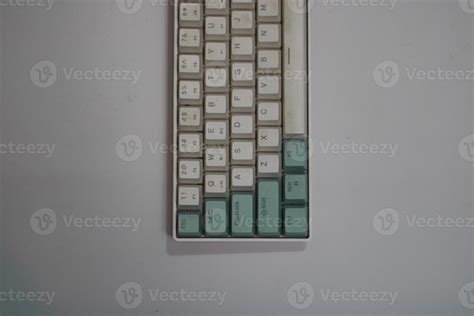 photo of a white and light blue computer keyboard 22929458 Stock Photo at Vecteezy