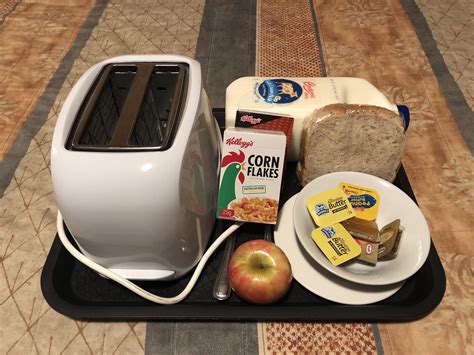 A motel served me this breakfast tray for $15 and contains a toaster ...