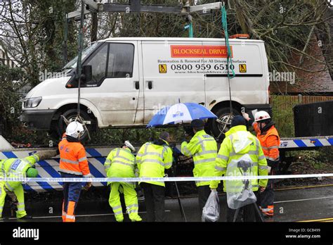 Hit And Run Accident Police Remove An Abandoned Vehicle After A