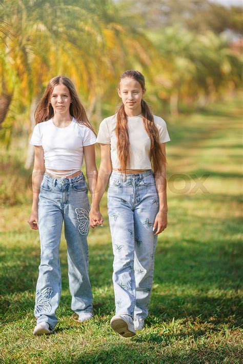 Beautiful Teen Girls Having Fun Together On Summer Tropical Vacation