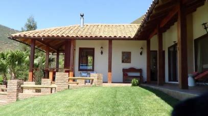 A House That Is Sitting In The Grass