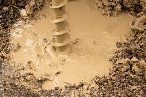 The process of drilling a water well with a winding drill Stock Photo | Adobe Stock